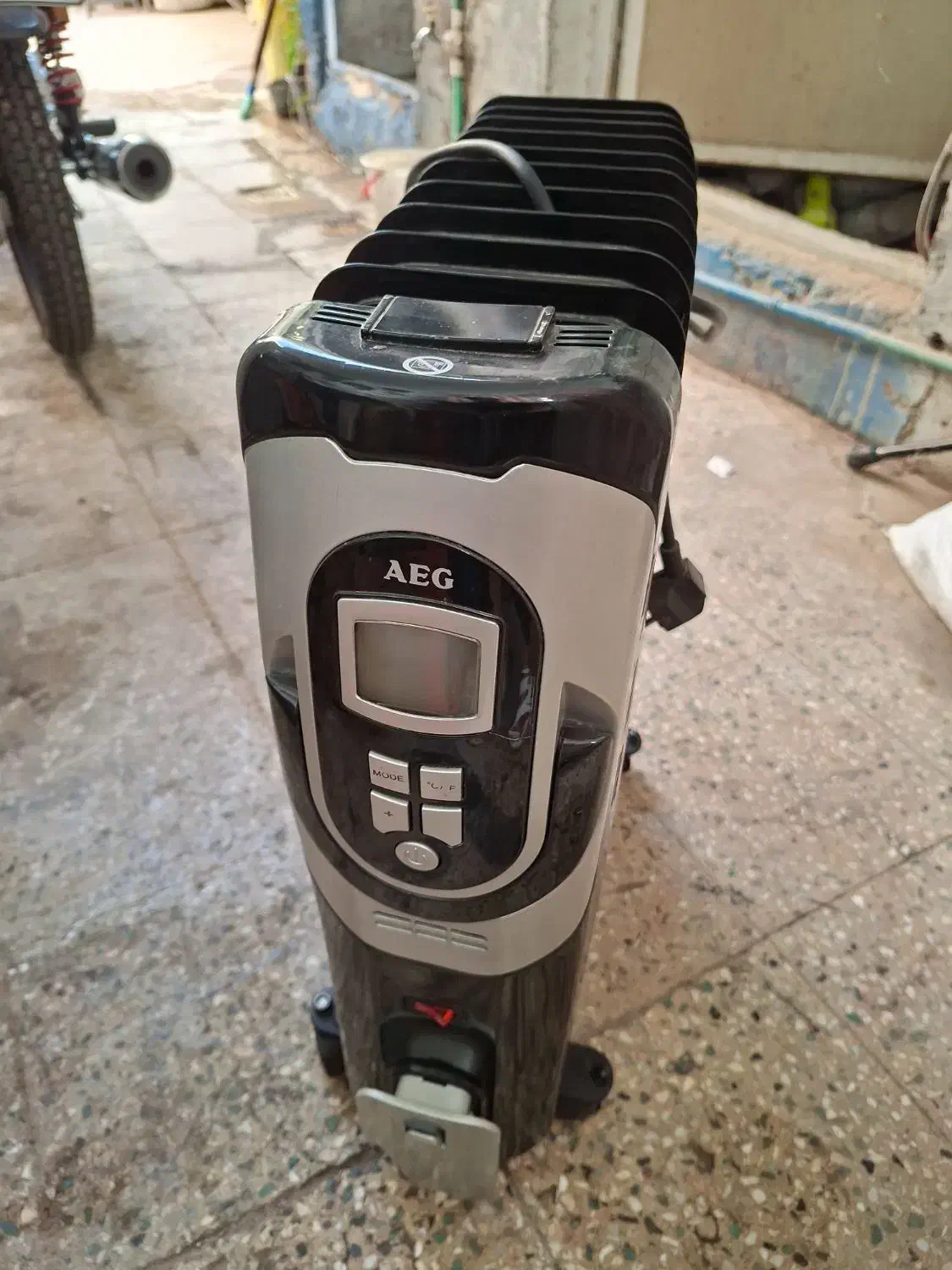 بخاری برقی روغنی|بخاری، هیتر، شومینه|قم, هفت تیر|دیوار