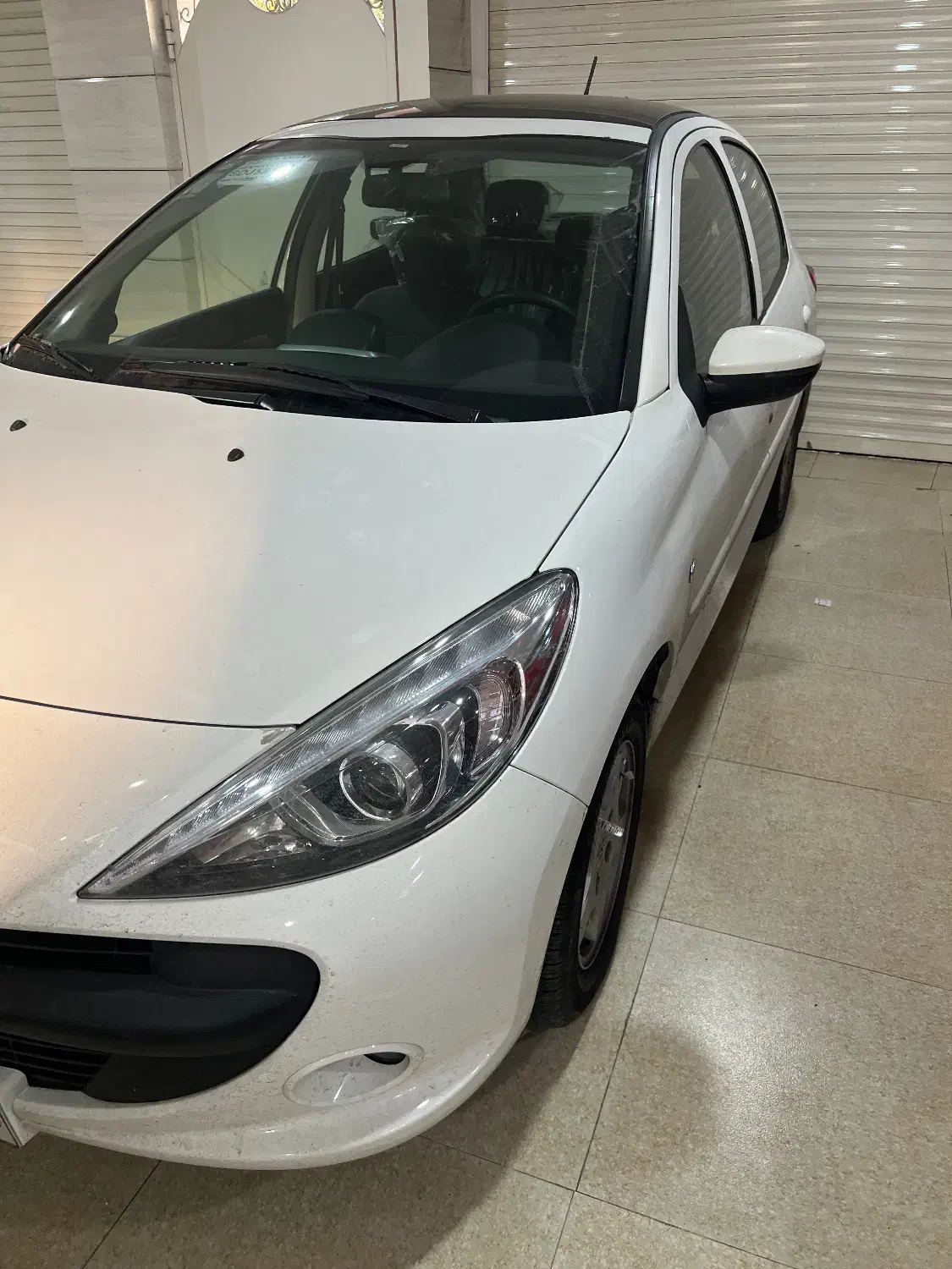 207 1404|خودرو سواری و وانت|لاهیجان, شیشه گران|دیوار