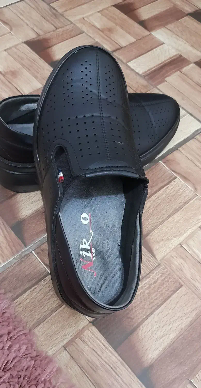 کفش طبی|کیف، کفش، کمربند|رشت, فلسطین|دیوار