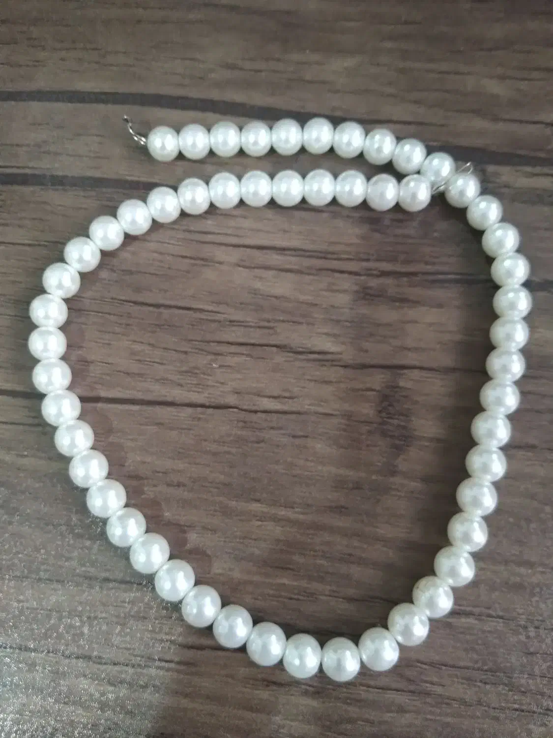 گردنبندمروارید|بدلیجات|رشت, دروازه لاکان|دیوار