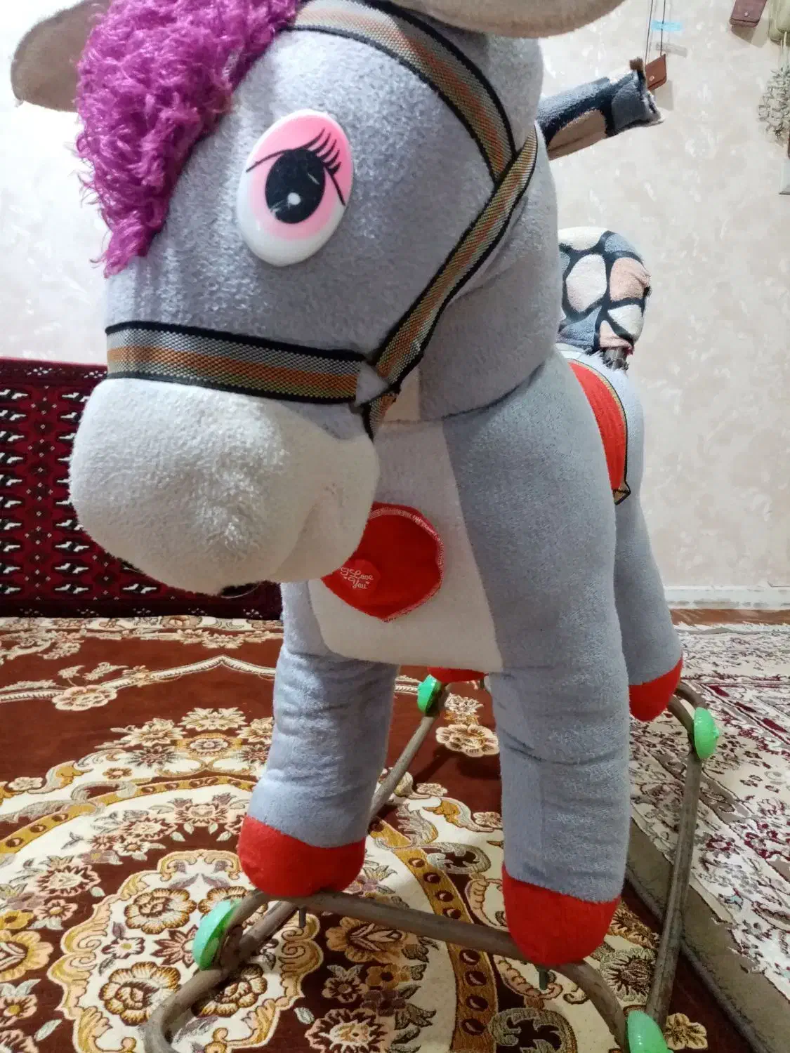 اسب راکر|اسباب‌بازی بچه|رشت, پل تالشان|دیوار