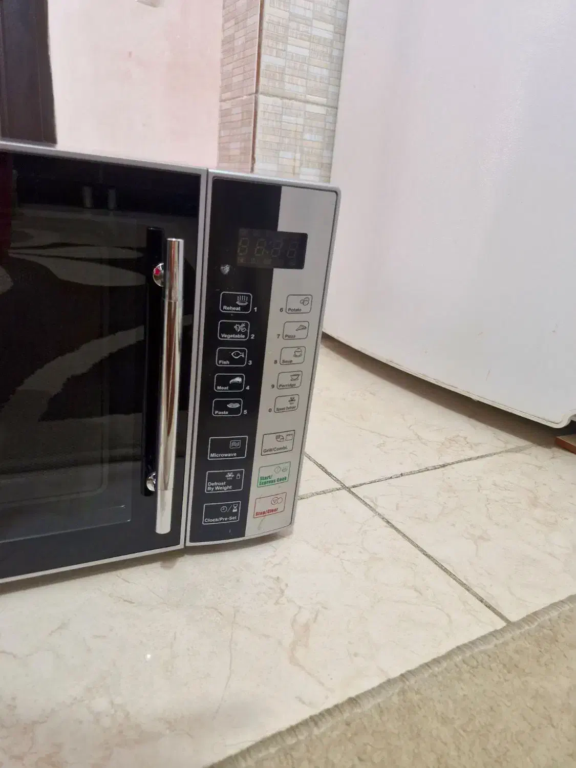 مایکرو ویو کنوود کاملا سالم فقط ۱بار استفاده کردم|اجاق گاز و لوازم برقی پختوپز|کرمانشاه, |دیوار