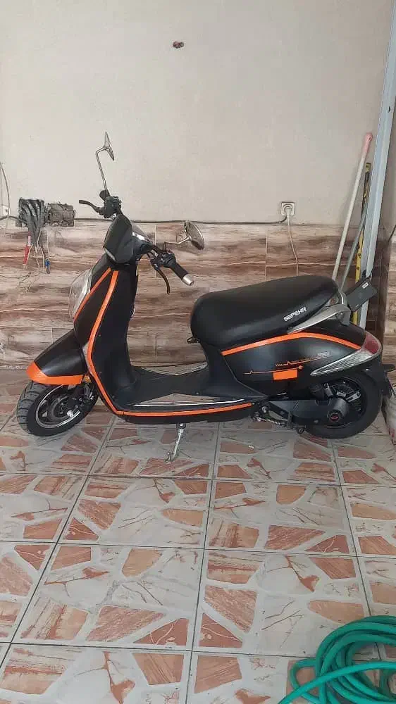 موتور سیکلت برقی|موتورسیکلت|لاهیجان, شیشه گران|دیوار