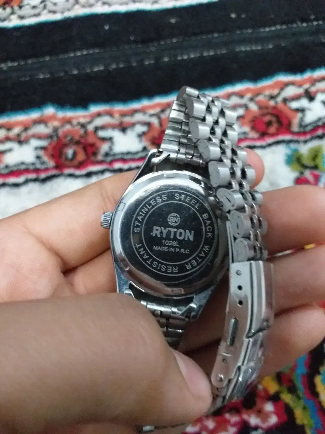 اصل|ساعت|مشهد, طبرسی شمالی|دیوار