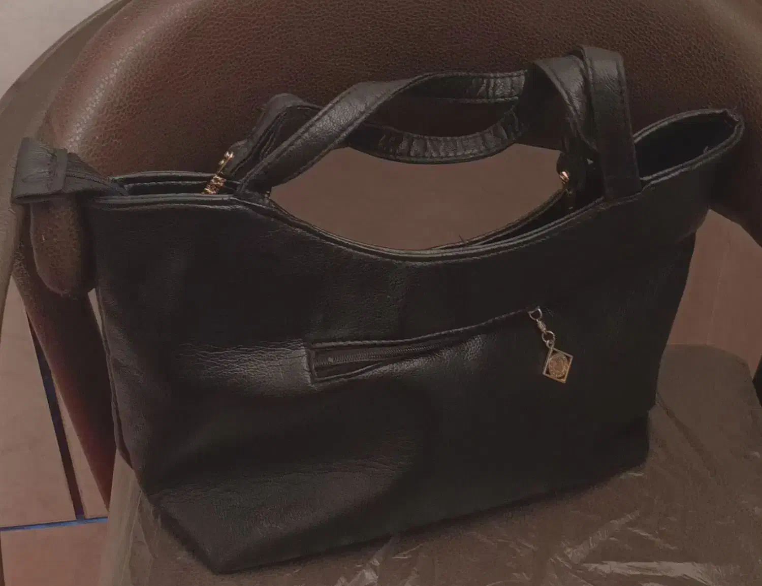 کیف|کیف، کفش، کمربند|مرودشت, تخت جمشید|دیوار