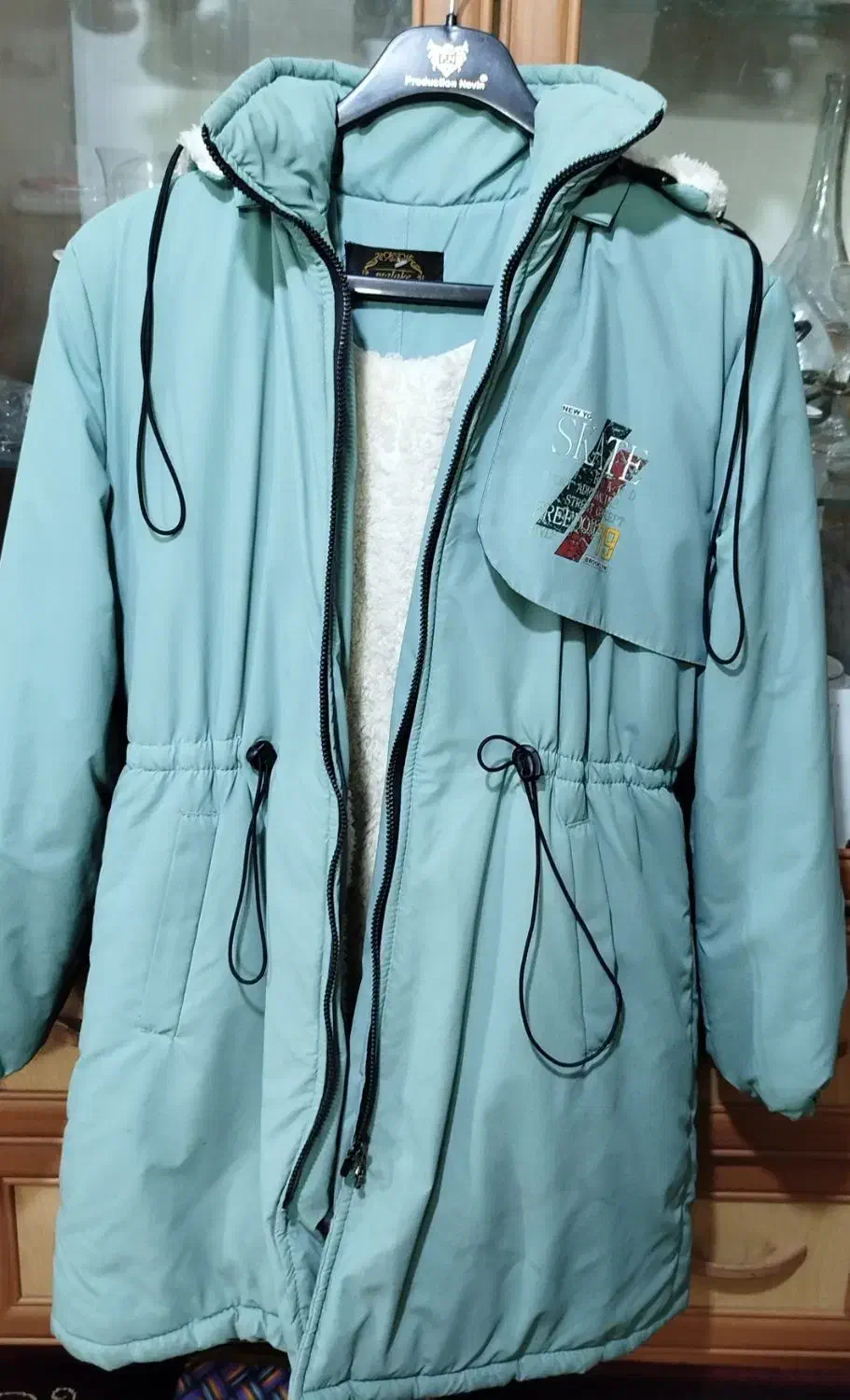 کاپشن|لباس|یزد, |دیوار