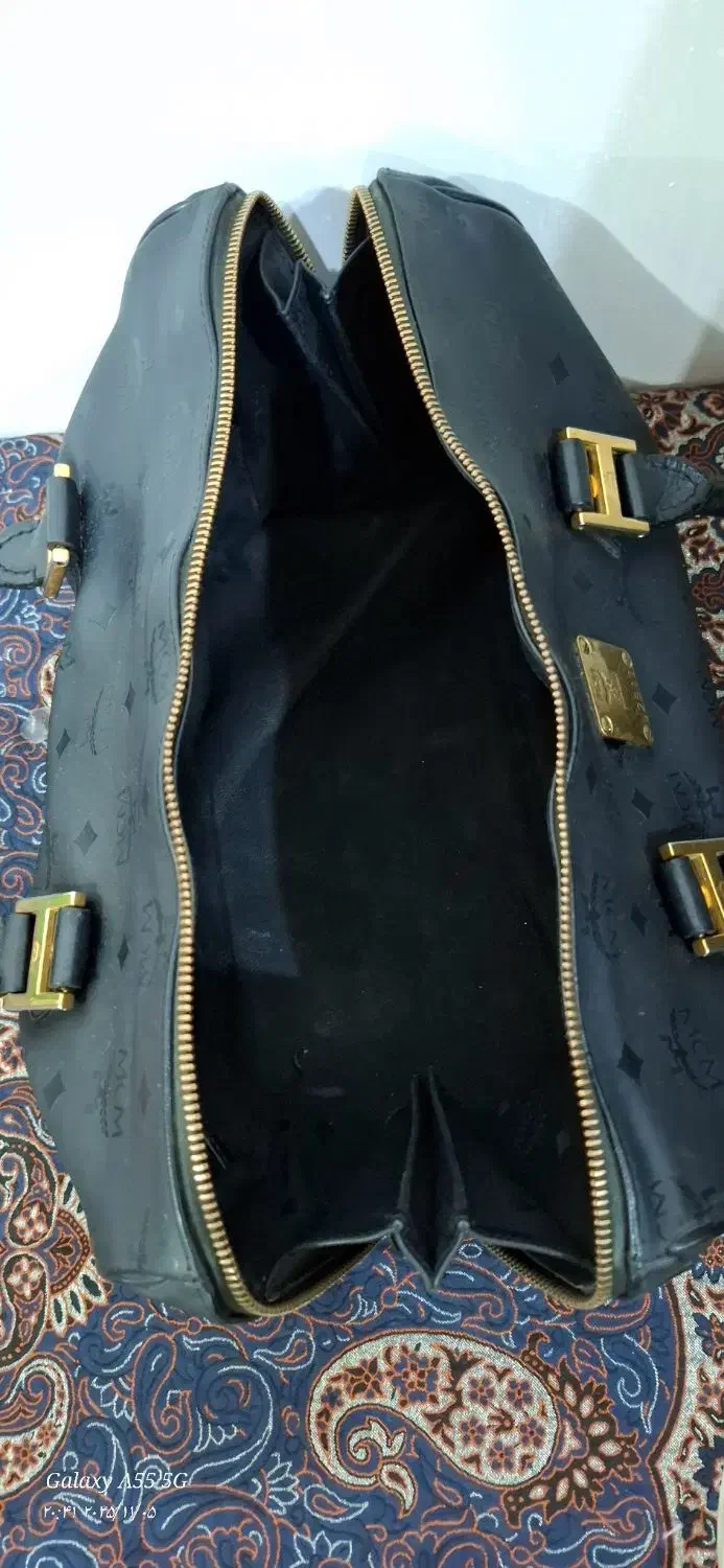 کیف|کیف، کفش، کمربند|مسجد سلیمان, |دیوار