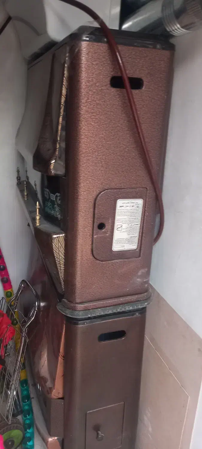 بخاری طرح شومینه ...جنس محکم و بادوام رنگ مسی|بخاری، هیتر، شومینه|زنجان, |دیوار