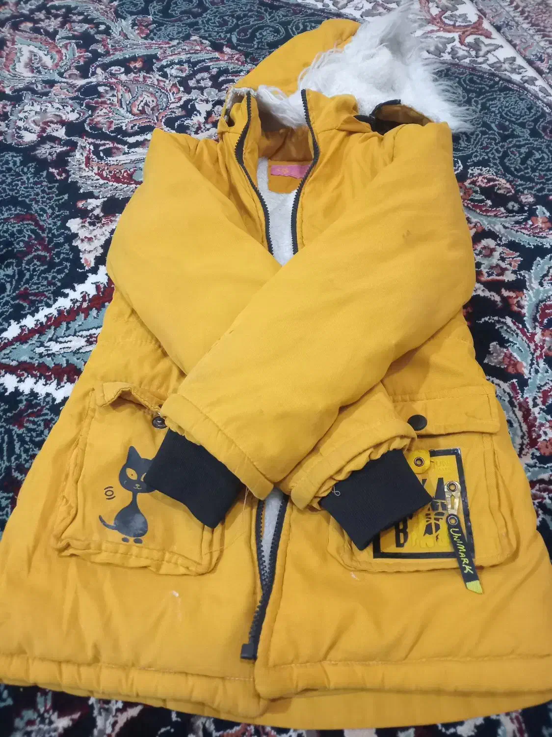 کاپشن|لباس|تربت جام, جامرود|دیوار