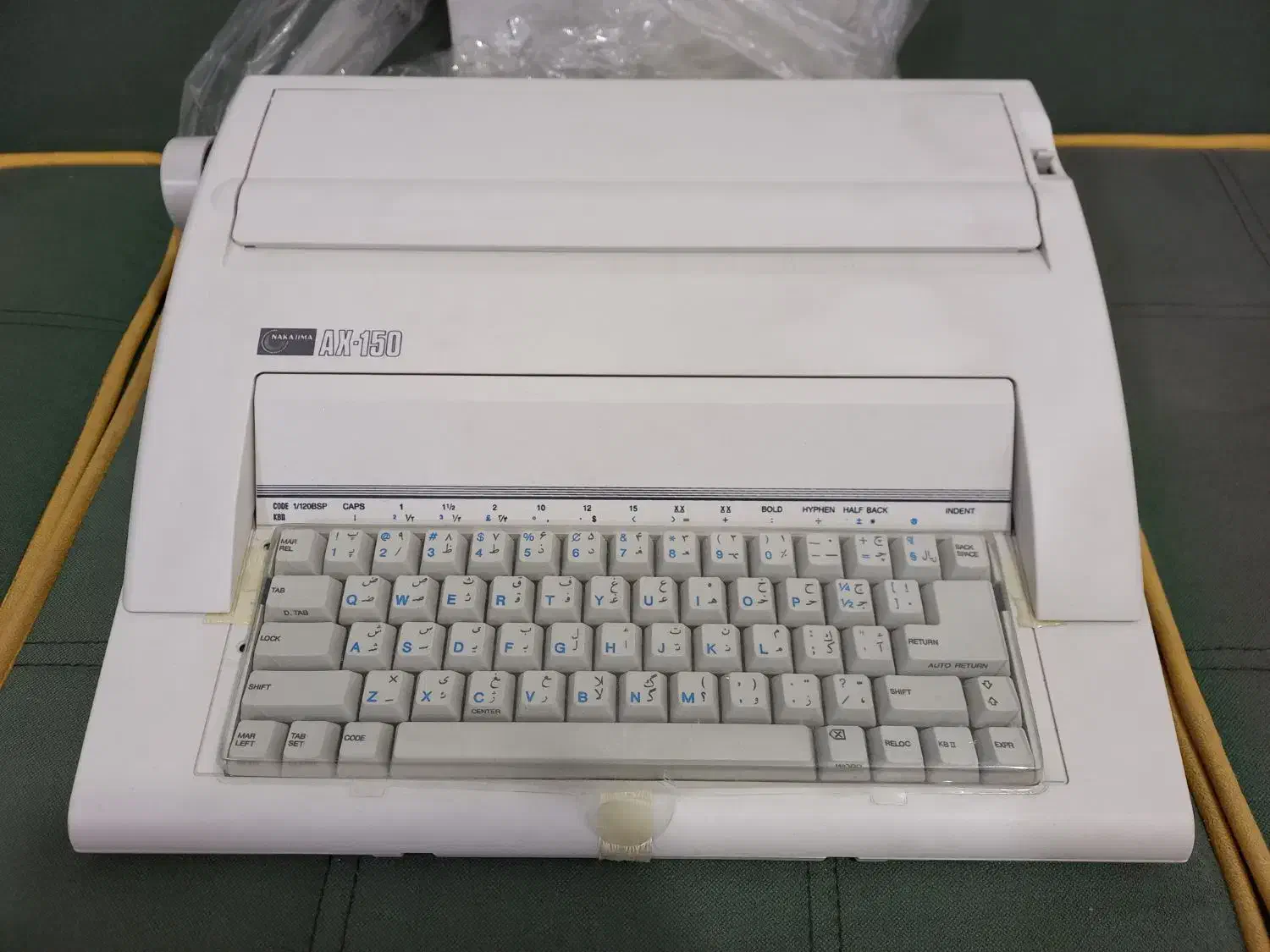 ماشین تایپ برقی قدیمی نو و آکبند ناکاجیما|کلکسیون اشیاء عتیقه|اندیمشک, |دیوار