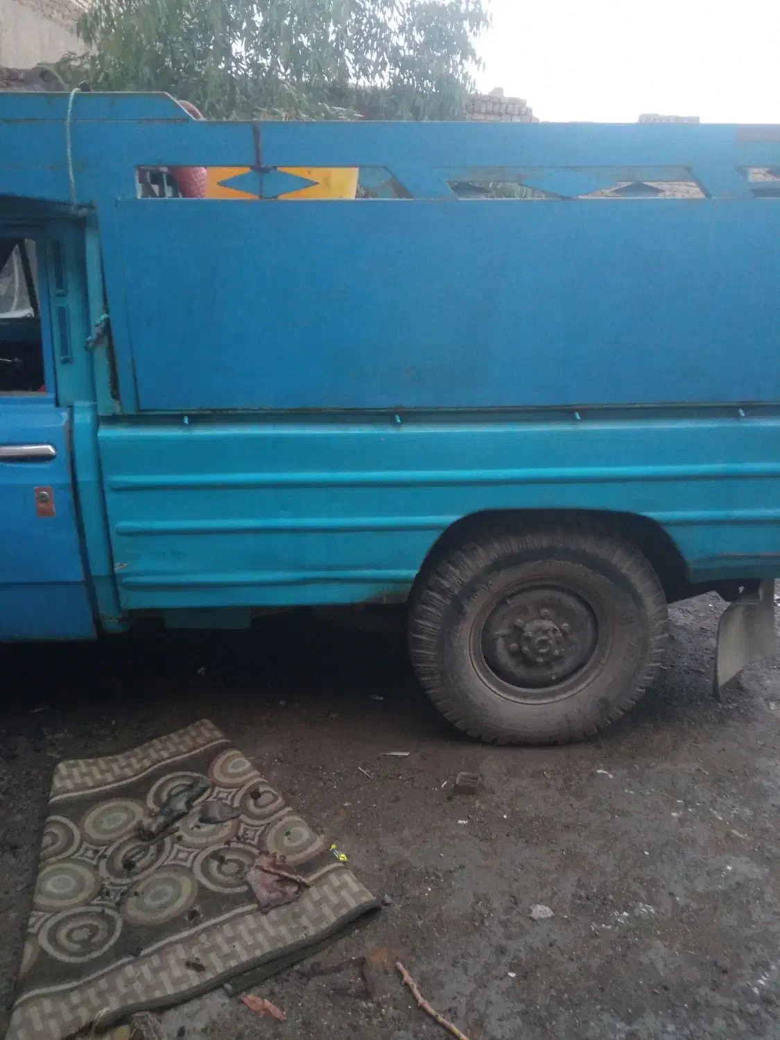 نیسان|خودرو سواری و وانت|قم, دروازه چوبی|دیوار