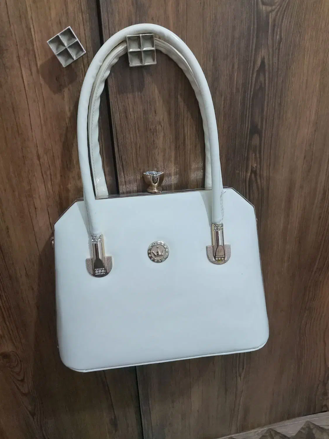 تعدادی مانتو و یدونه کیف مجلسی شیری|لباس|قدس, شهرقدس|دیوار