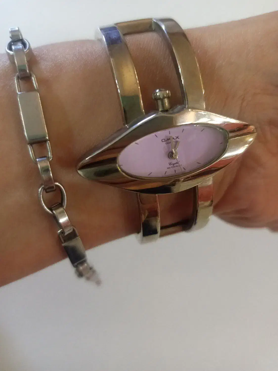 ساعت استیل OMAX اصل قدیمی عتیقه ودستبند  ورساچه|کلکسیون اشیاء عتیقه|شیراز, قدوسی شرقی|دیوار