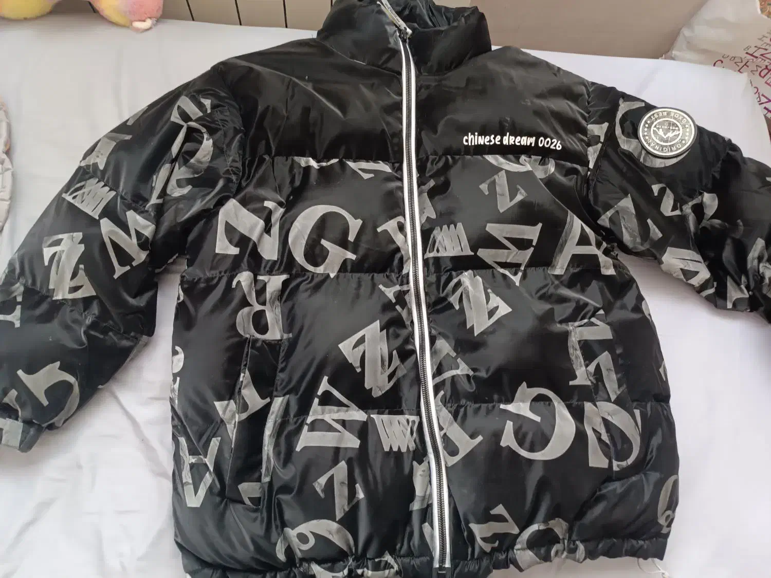 کاپشن|لباس|زنجان, |دیوار