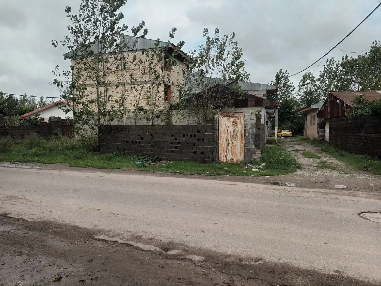 زمین دوردیوار بر اصلی خیابان نوروزی فخب|فروش زمین و ملک کلنگی|رشت, پیله داربن|دیوار