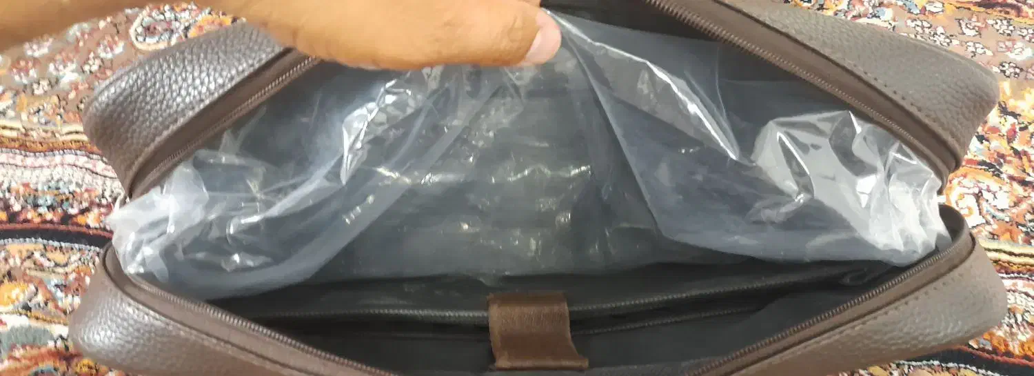 کیف اداری|کیف، کفش، کمربند|تربتحیدریه, مسجد جامع|دیوار