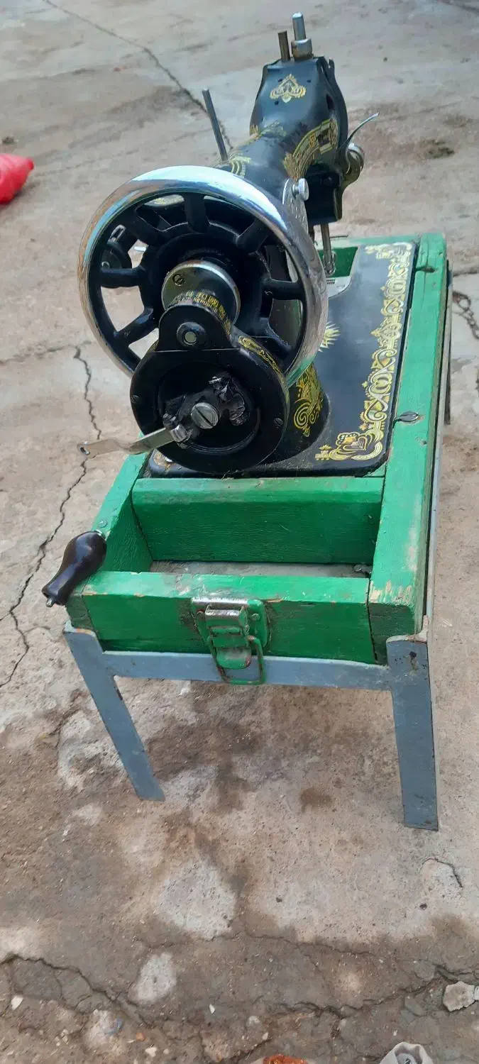 چرخ خیاطی مرد پرنده|چرخ خیاطی و ریسندگی|مسجد سلیمان, |دیوار