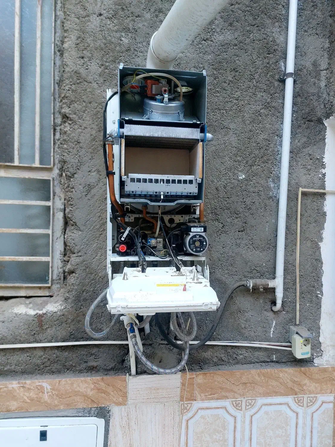 نصب،سرویس،پکیج،رادیاتور،اسپیلت|آبگرمکن، پکیج، شوفاژ|زاهدان, |دیوار