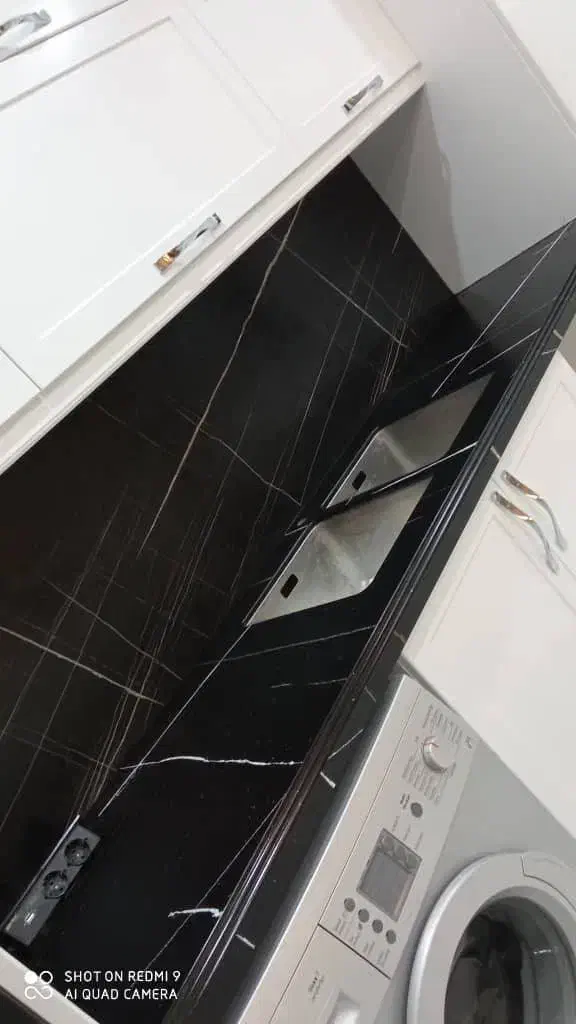 اجرای کانترتاپ سنگ طبیعی کوارتز کورین سرامیک ال جی|خدمات پیشه و مهارت|آمل, |دیوار