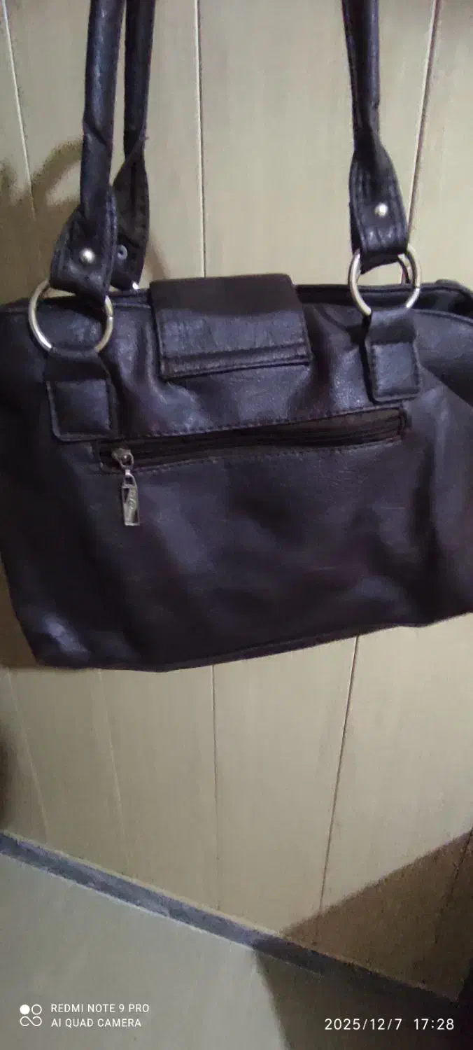 کیف|کیف، کفش، کمربند|نهاوند, |دیوار