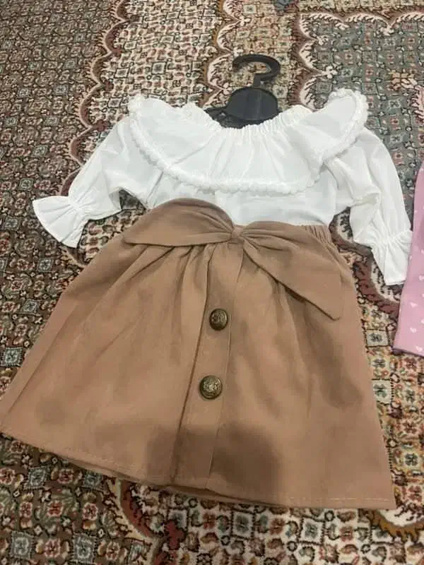 لباس|کفش و لباس بچه|قائن, |دیوار
