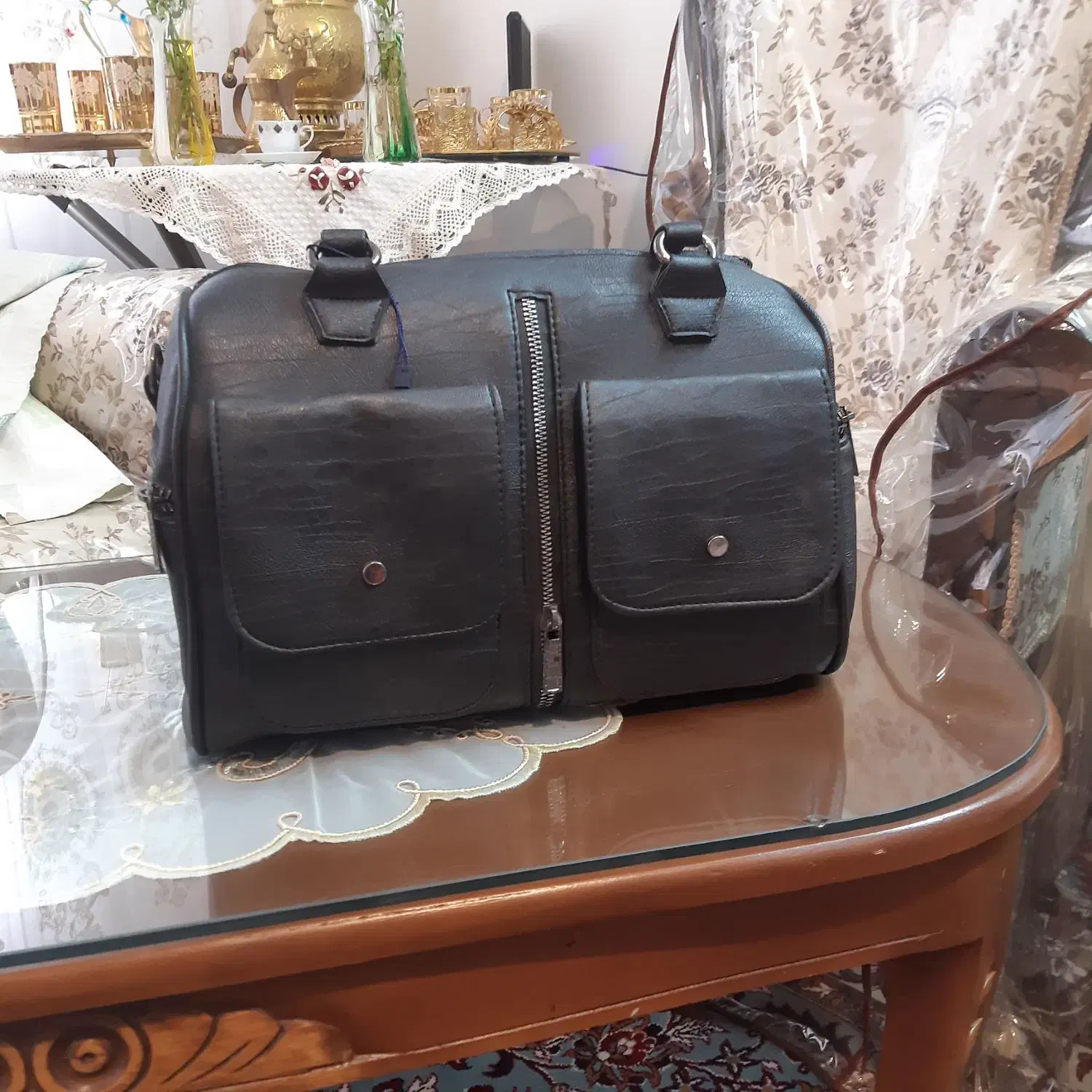 کیف|کیف، کفش، کمربند|مشهد, کوشش|دیوار
