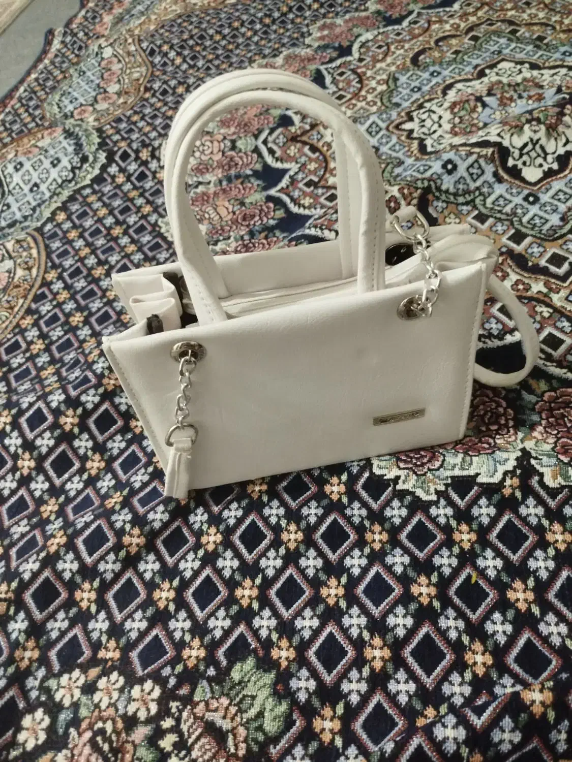 کیف مجلسی|کیف، کفش، کمربند|قم, حکمت شمالی|دیوار