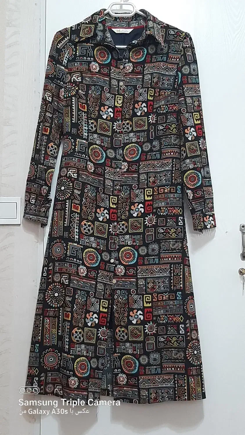 مانتو|لباس|قم, ولیعصر|دیوار