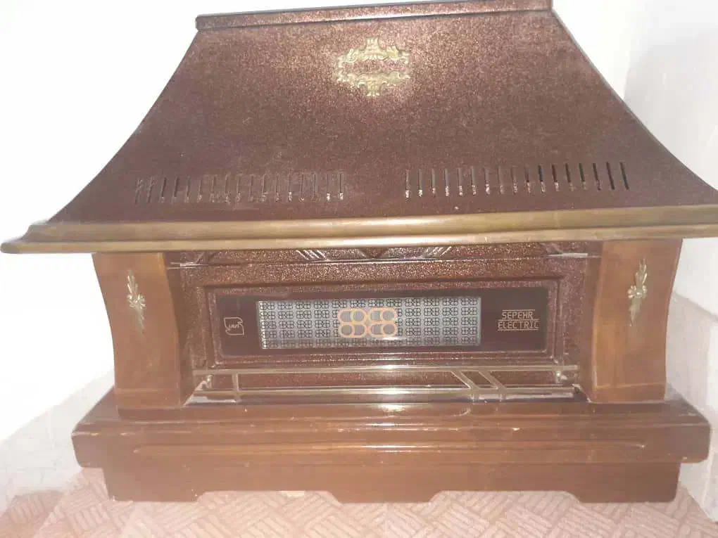 بخاری طرح شومینه پایه چوبی|بخاری، هیتر، شومینه|فردیس, شهرک راه آهن|دیوار