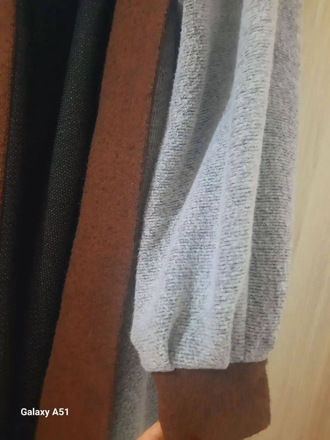 دوعدد پالتوی کوتاه و بلند|لباس|نمین, |دیوار