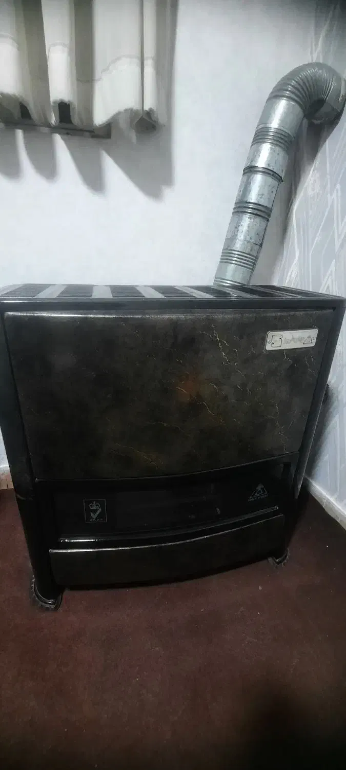 بخاری جهان افروز|بخاری، هیتر، شومینه|ری, دیلمان|دیوار