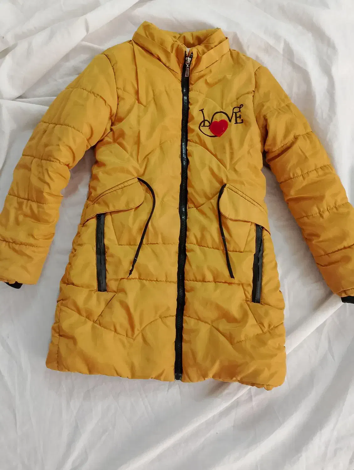 کاپشن|لباس|مشهد, شترک|دیوار