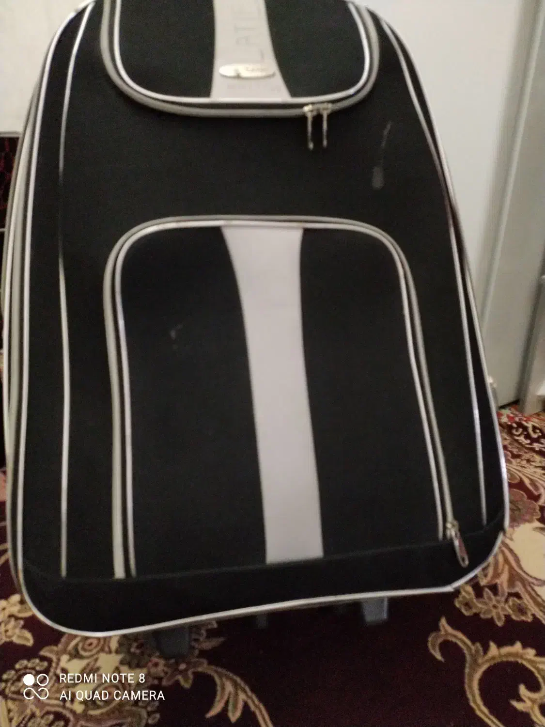 چمدان|کیف، کفش، کمربند|قم, نیروگاه|دیوار