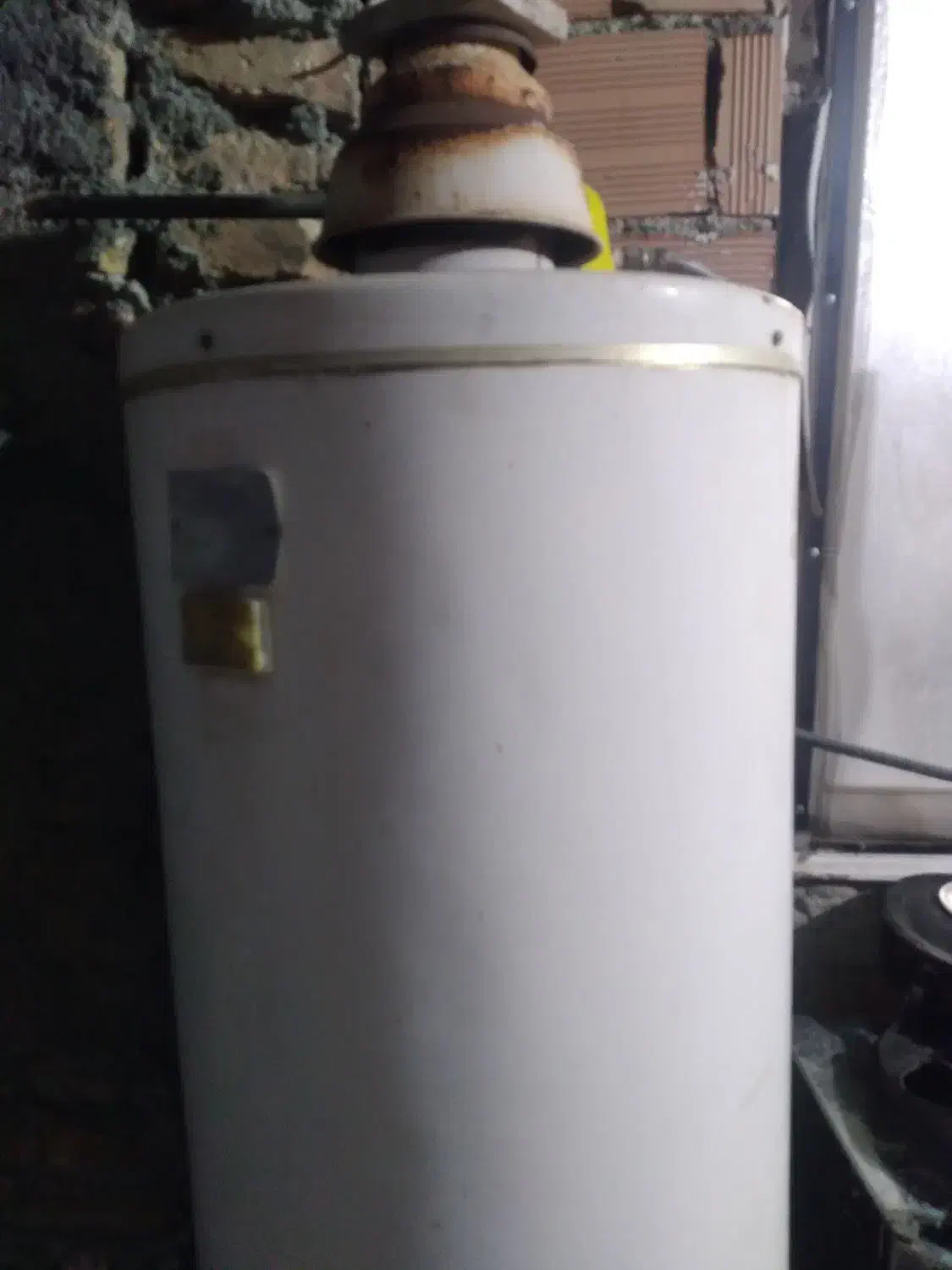 تعمیر آبگرمکن مخزنی وتعمیربخاری وجوشکاری آهن آلات|خدمات پیشه و مهارت|گرگان, |دیوار