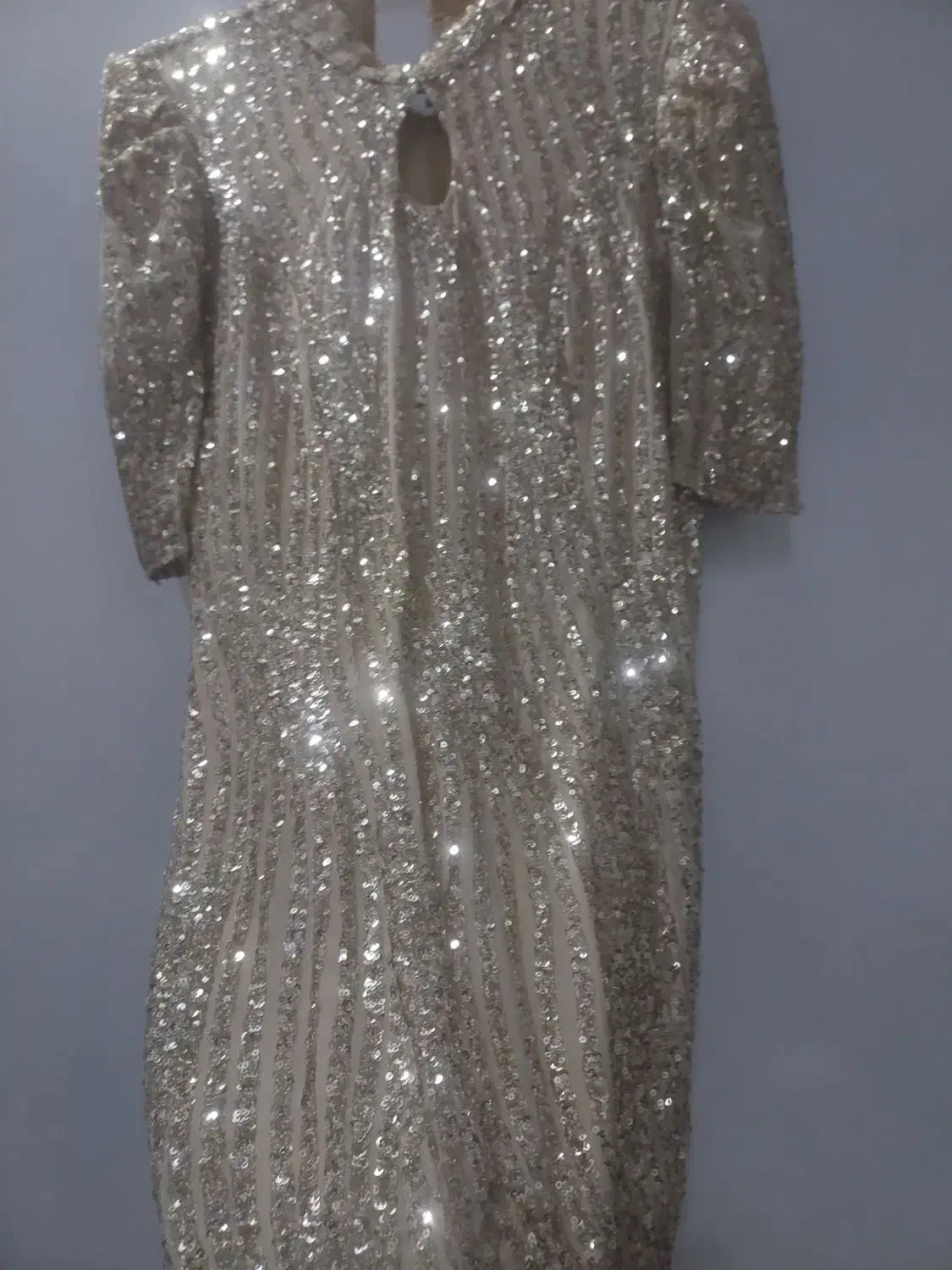 لباس مجلسی|لباس|مشهد, گرجی علیا|دیوار