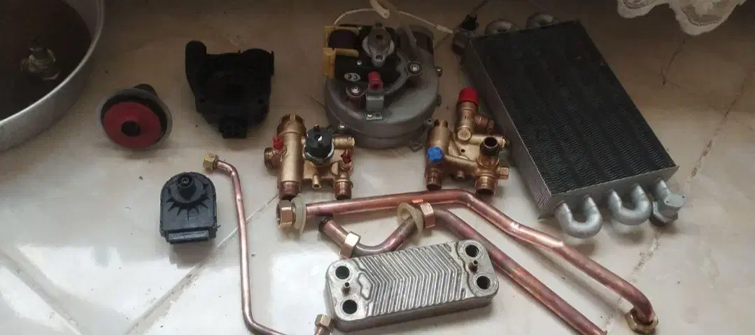 نصب وتعمیر انواع پکیج دیواری و آبگرمکن|آبگرمکن، پکیج، شوفاژ|مشهد, بهار|دیوار