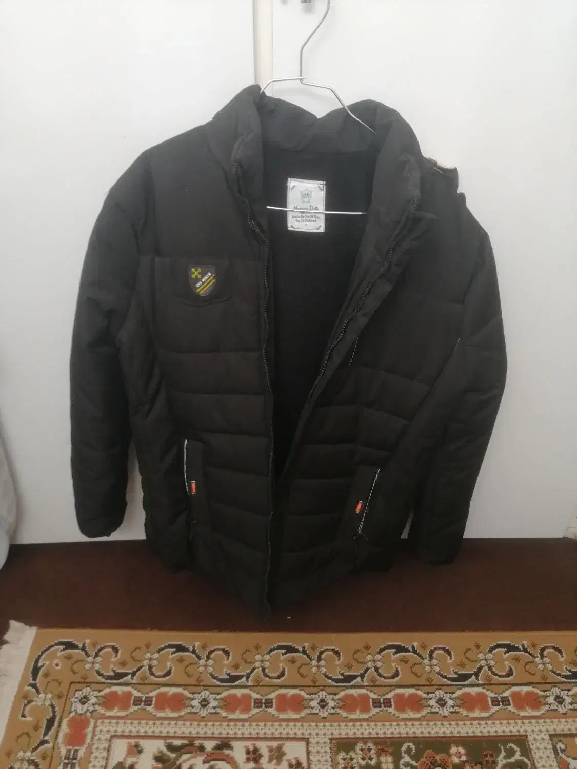 کاپشن|لباس|تربت‌حیدریه, مظفریه|دیوار