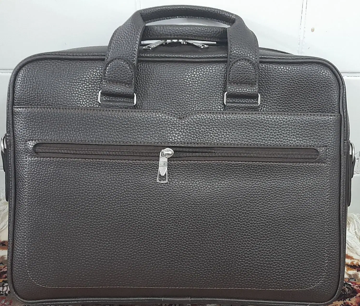 کیف اداری|کیف، کفش، کمربند|تربتحیدریه, مسجد جامع|دیوار