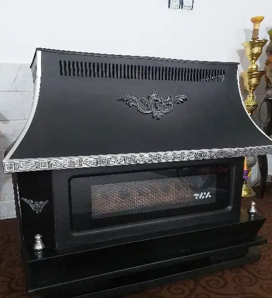 بخاری شومینه ای|بخاری، هیتر، شومینه|قم, وادی السلام|دیوار