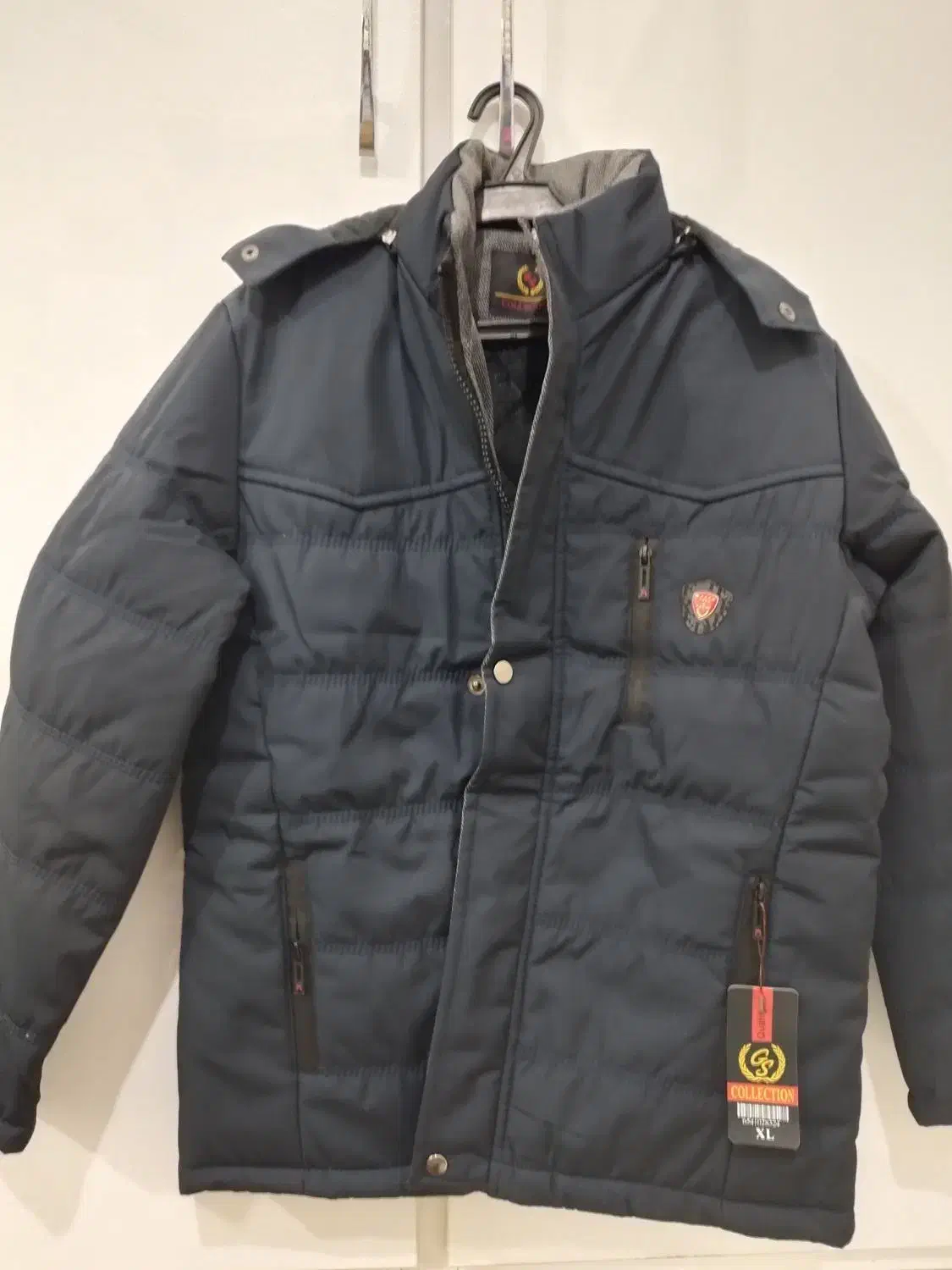 کاپشن|لباس|اهواز, منبع اب|دیوار