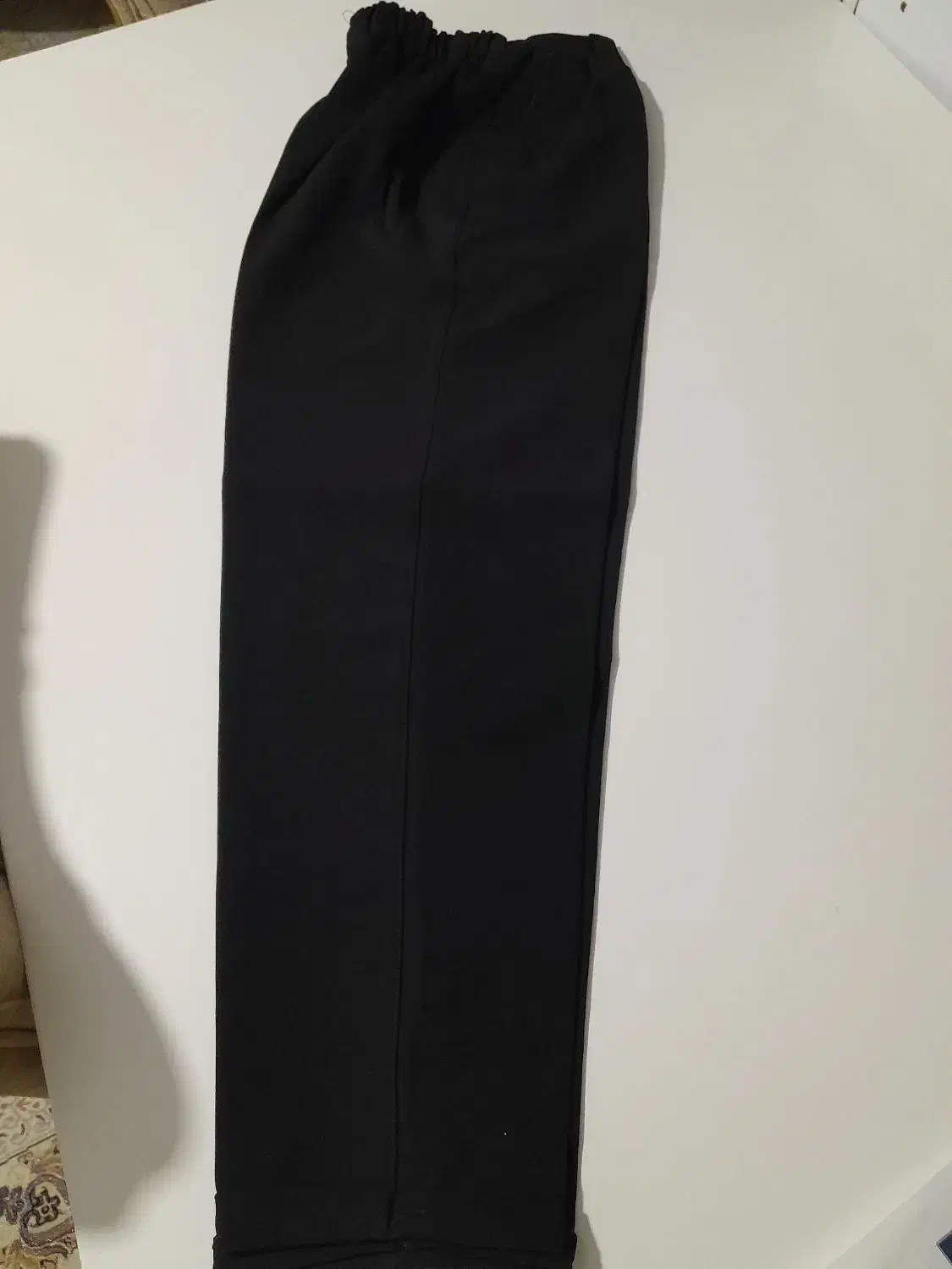 شلوار پاکتی نو|لباس|قدس, شهر‌قدس|دیوار