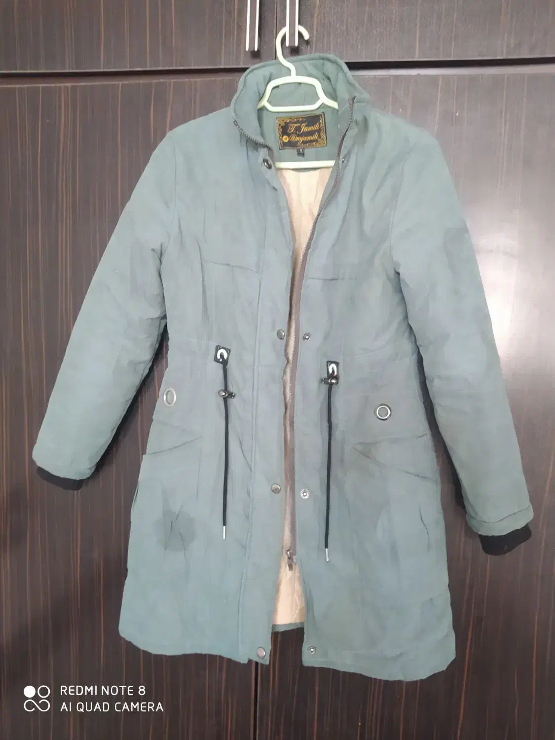 کاپشن|لباس|فردوس (خراسان), |دیوار