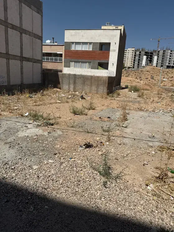 زمین درب از ساختمان پیام نور مخابرات (شهرک گلستان)|فروش زمین و ملک کلنگی|شیراز, شهرک گلستان شمالی|دیوار