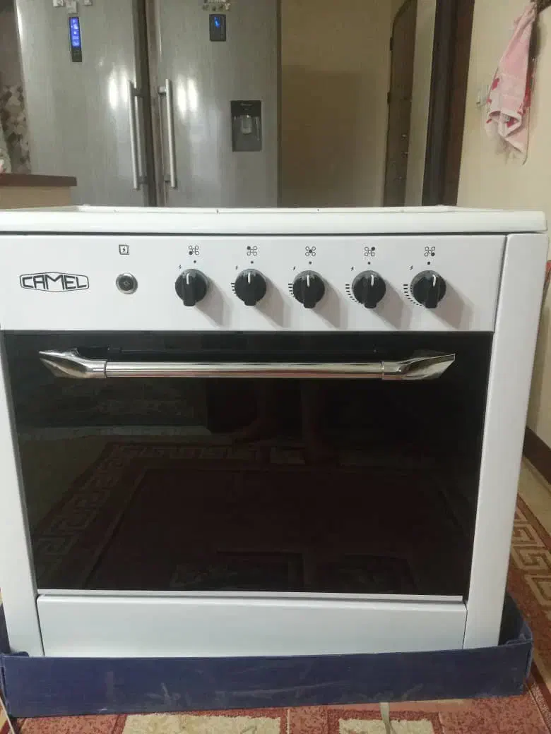 گاز پنج شعله طرح فر صفحه لعابی سفید|اجاق گاز و لوازم برقی پختوپز|شیراز, شهرک بهار|دیوار