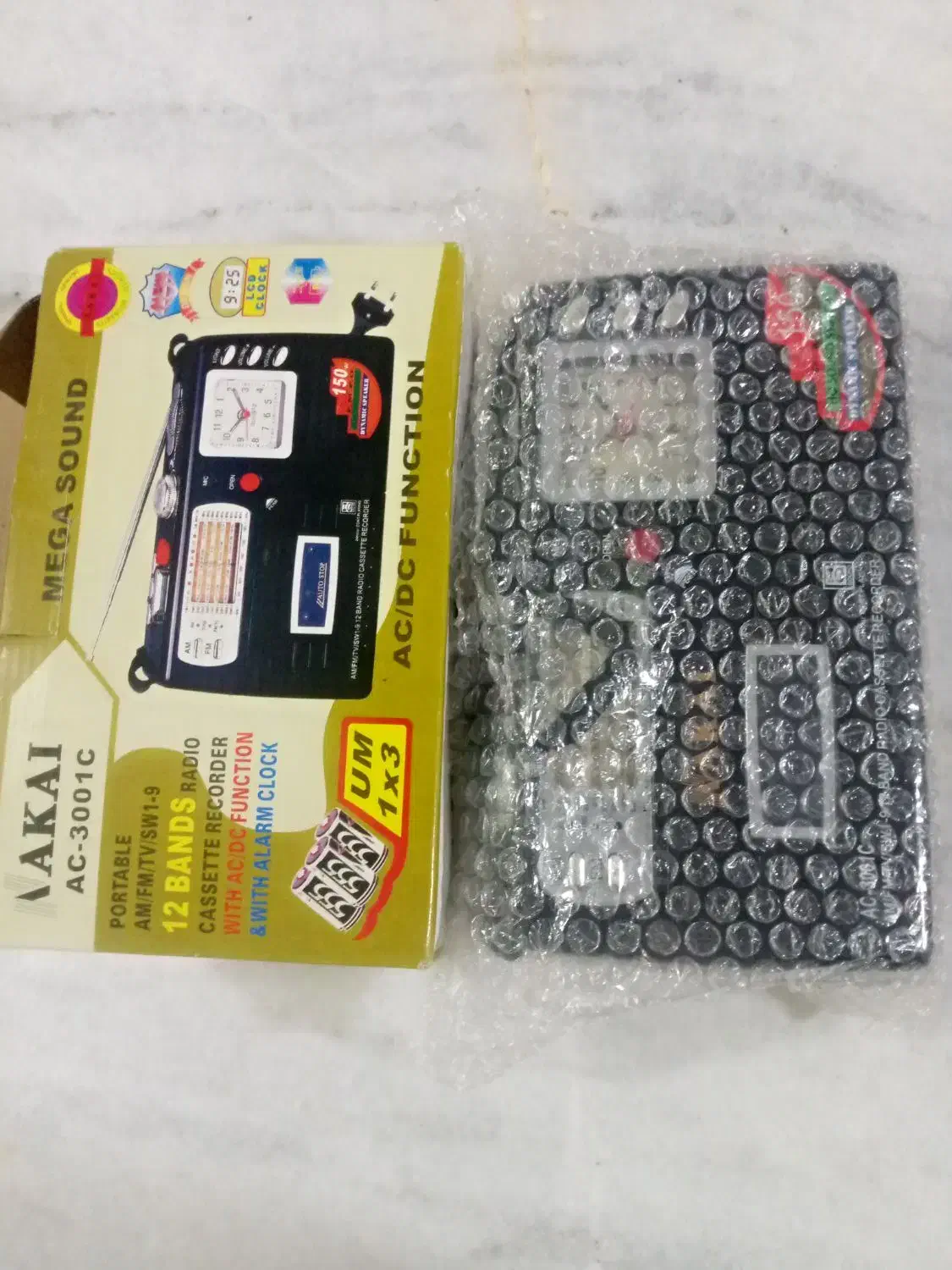 رادیو و کاست آکی|صوتی و تصویری|تایباد, |دیوار