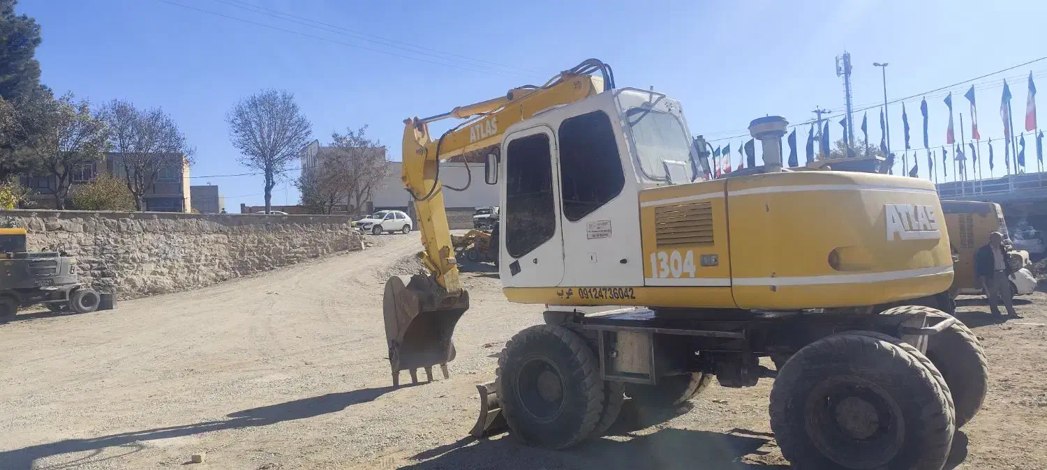 فروش بیل مکانیکی لاستیکی اطلس 1304|خودرو سنگین|شاهرود, |دیوار