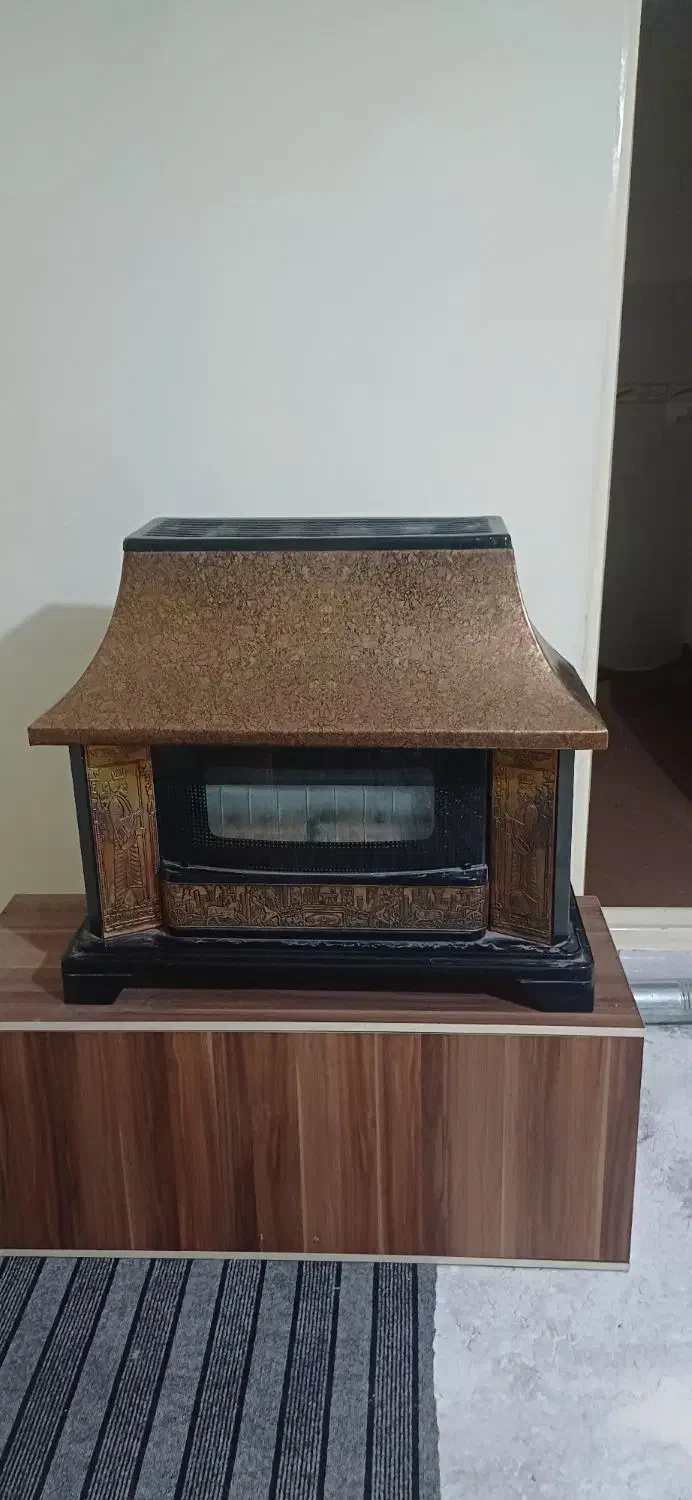 بخاری شومینه ای کاملا سالم کم کارکرده در حد نو|بخاری، هیتر، شومینه|بهارستان, |دیوار