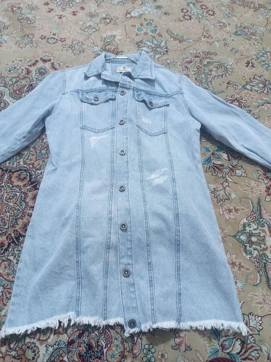 کاپشن|لباس|مشهد, موعود|دیوار