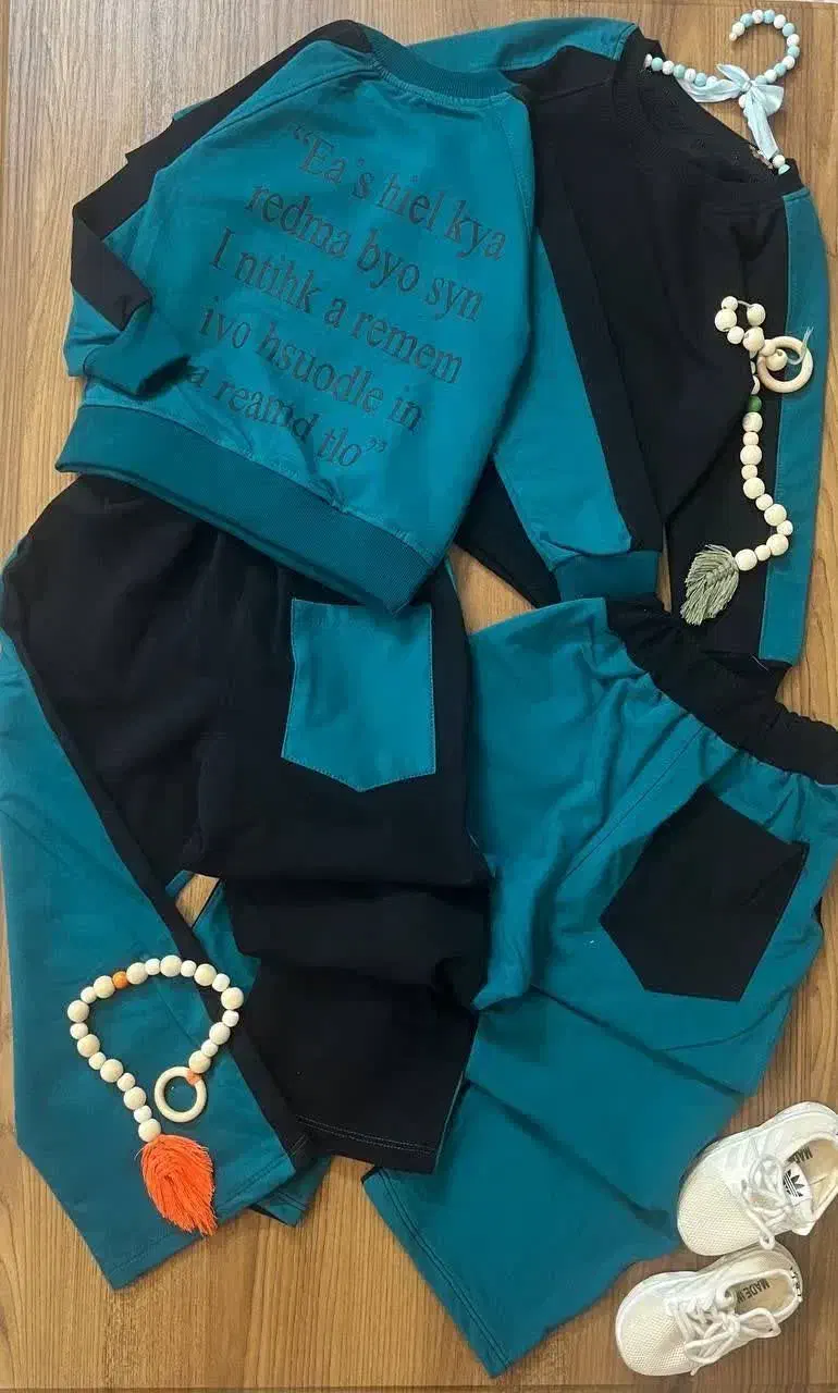 لباس پسرانه|لباس|قم, وادی السلام|دیوار