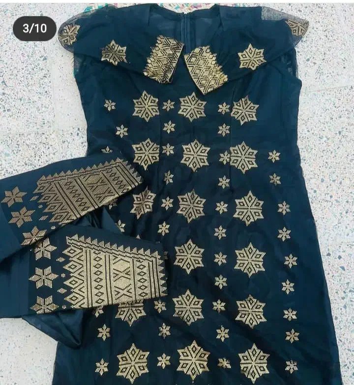 لباس قسطی|لباس|میناب, |دیوار